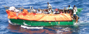 050429-N-5526M-001 (Apr. 29, 2005) Crew members assigned to the US Navy (USN) Cyclone Class Coastal Defense Ship USS FIREBOLT (PC 10) rescue refugees from Somalia after their boat, a fishing Dowel, capsized somewhere out in the Indian Ocean (IOC).  The FIREBOLT is currently providing Maritime Security Operations (MSO) in support of Operation ENDURING FREEDOM. U.S. Navy official photo by Photographer's Mate First Class Robert R. McRill (RELEASED)